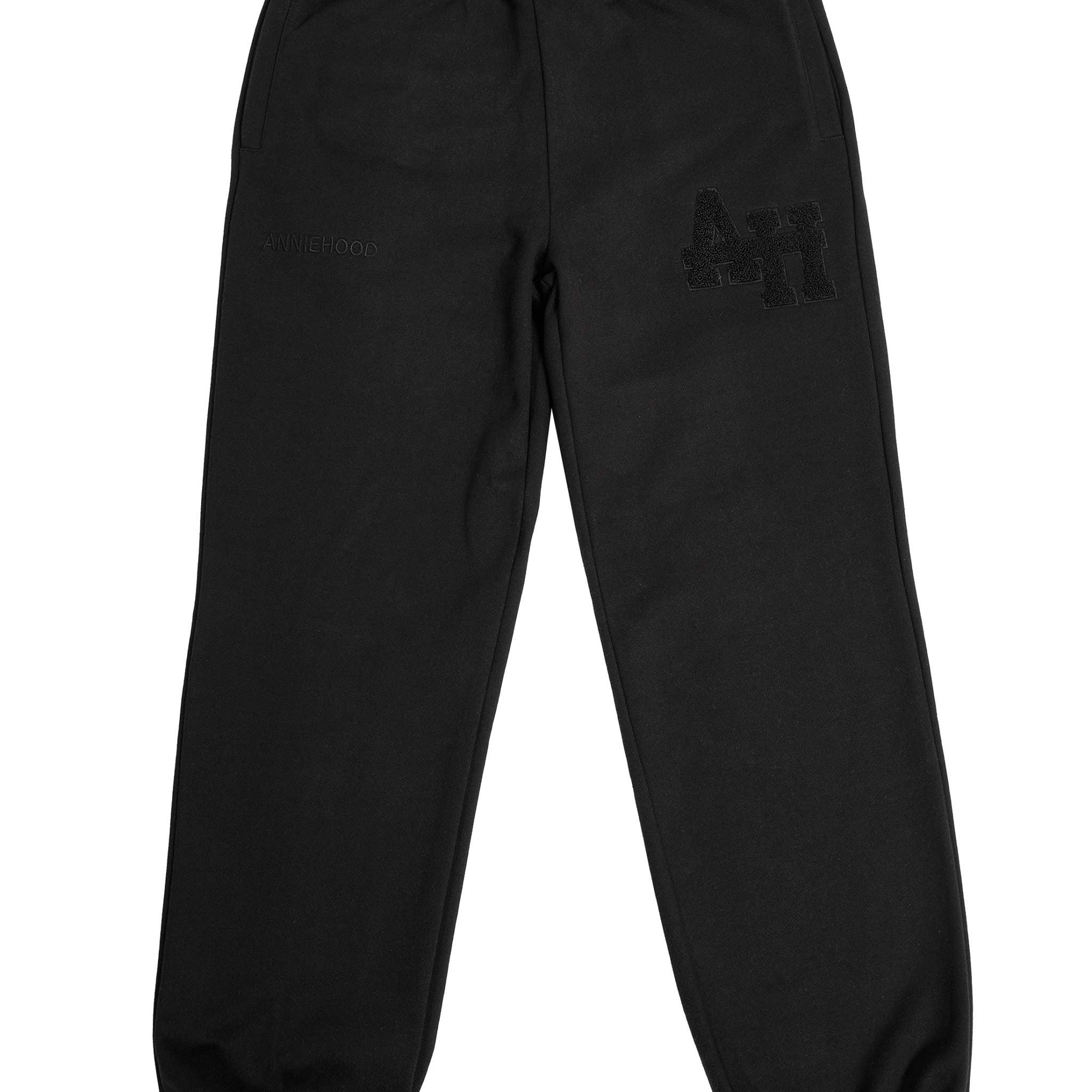 Black ANNIE HOOD College Joggers with tonal embroidery logos, crafted from premium cotton fleece.