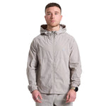 Man wearing grey Attain Active Track jacket with hood and zipper front on white background