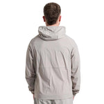Back view of man wearing grey Attain Active Track jacket with hood