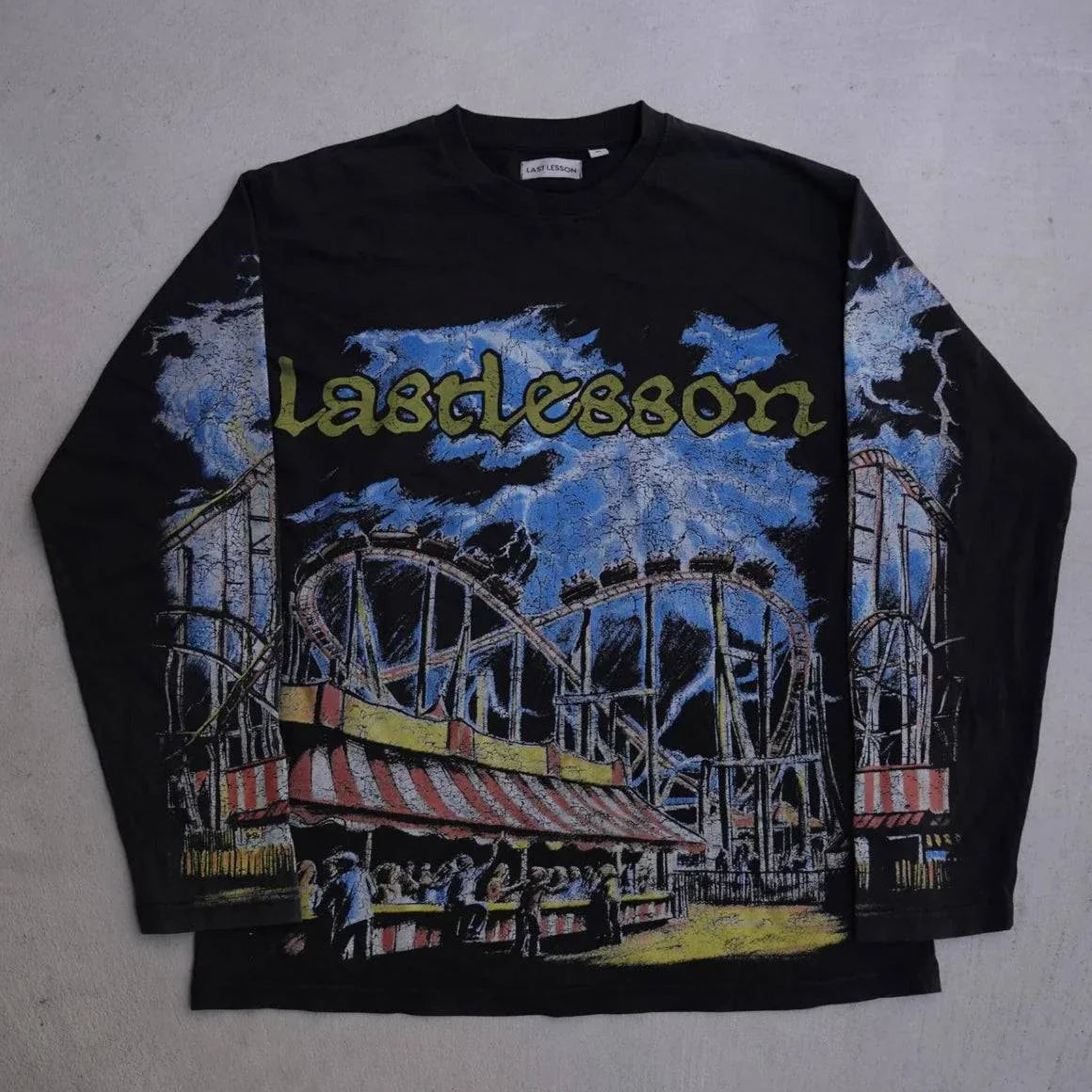 Last Lesson Carnival T-Shirt featuring amusement park design on black fabric.