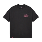 Broken Planet black t-shirt with pink star logo design