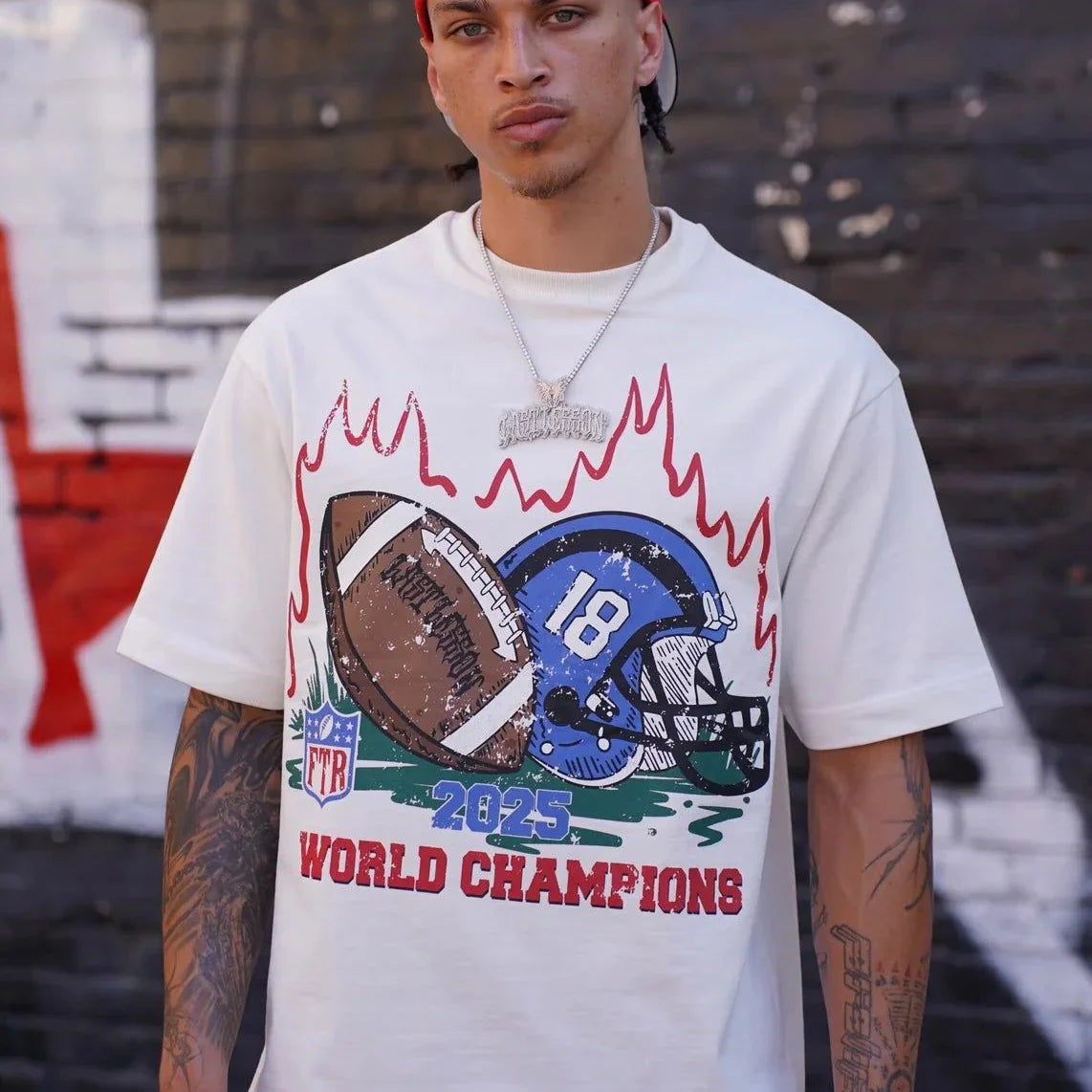 Man wearing Last Lesson FTR T-Shirt with championship graphic.