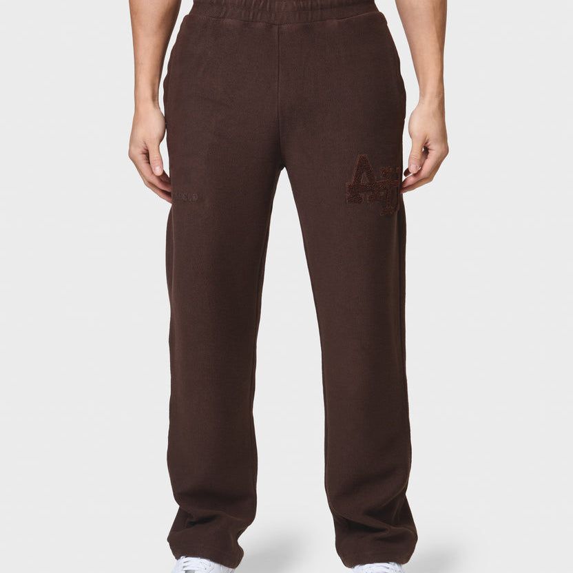 Annie Hood College Joggers in washed brown, relaxed fit, 500gsm brushback cotton, worn by 6'0" model with 31" waist