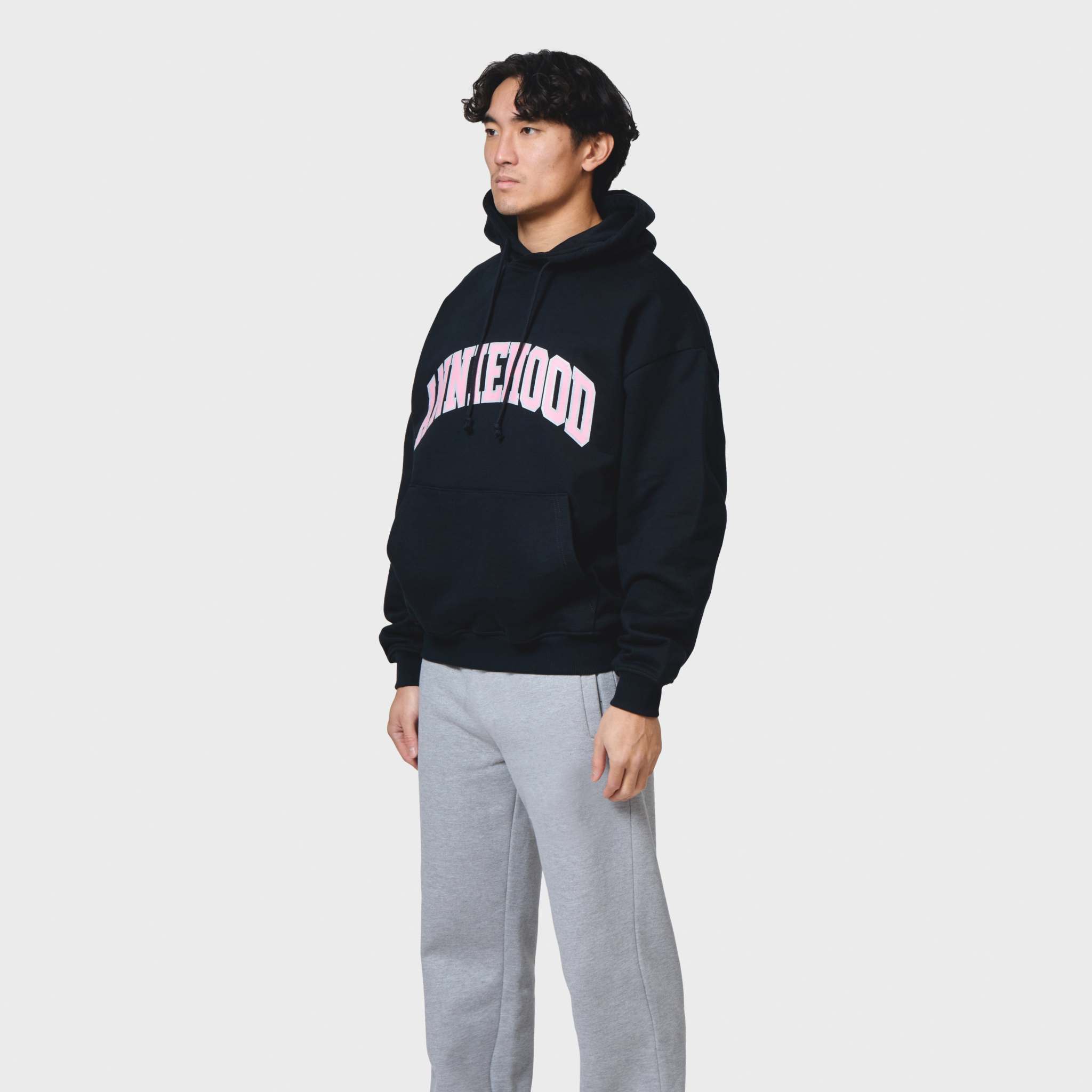 Navy ANNIE HOOD COLLEGE arch hoody in relaxed fit, 500gsm brushback cotton, worn by 6'0 model