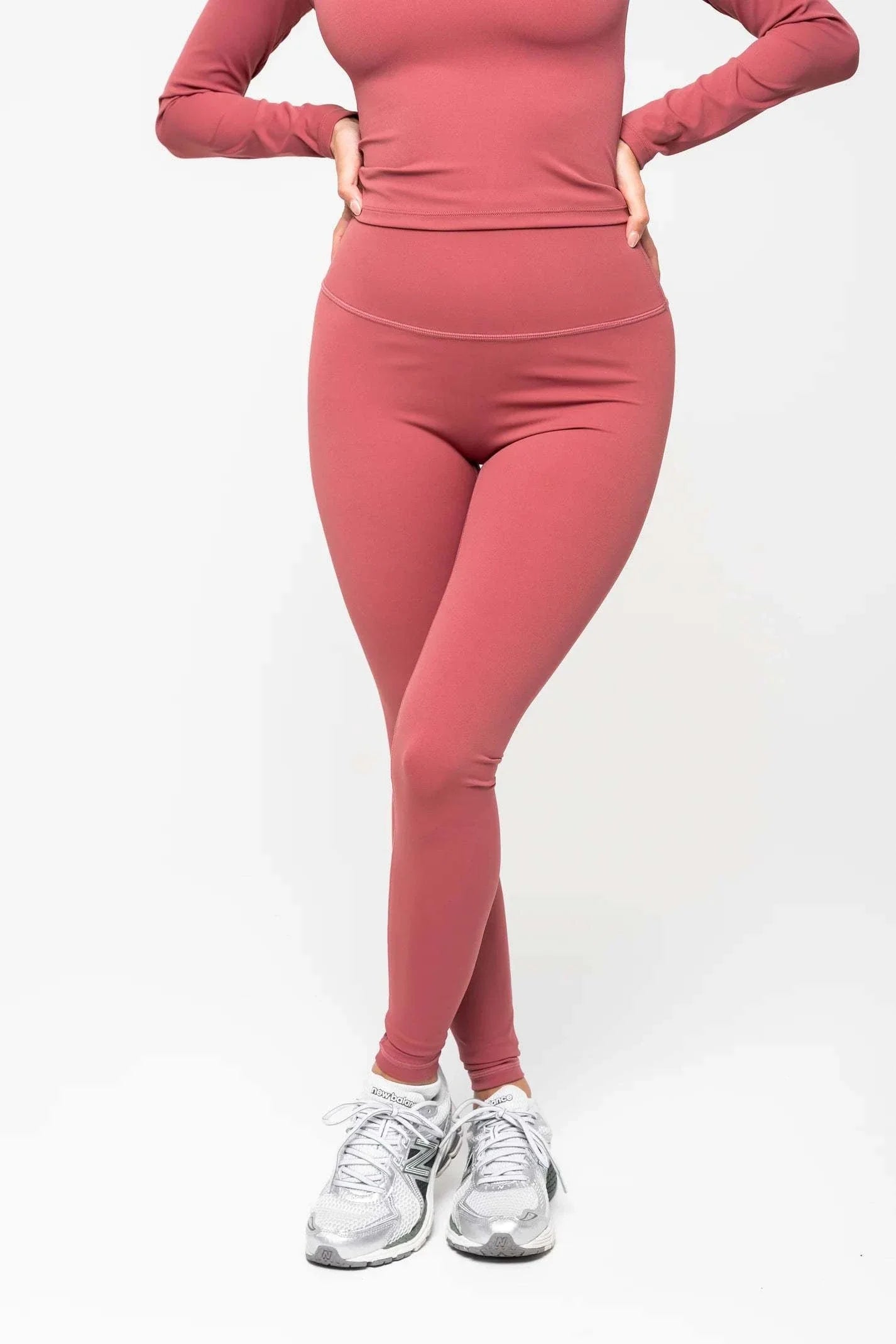 Berry-colored active leggings by Latte Monday, featuring lightweight stretch fabric for a flattering fit.