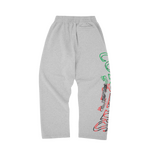 Corteiz x Denim Tears heather grey open hem sweatpants with graphic design on leg