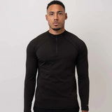 Cova Daily black quarter zip long sleeve top worn by male model