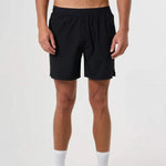 Black Cova Daily Shorts worn by male model with elastic waistband and relaxed fit