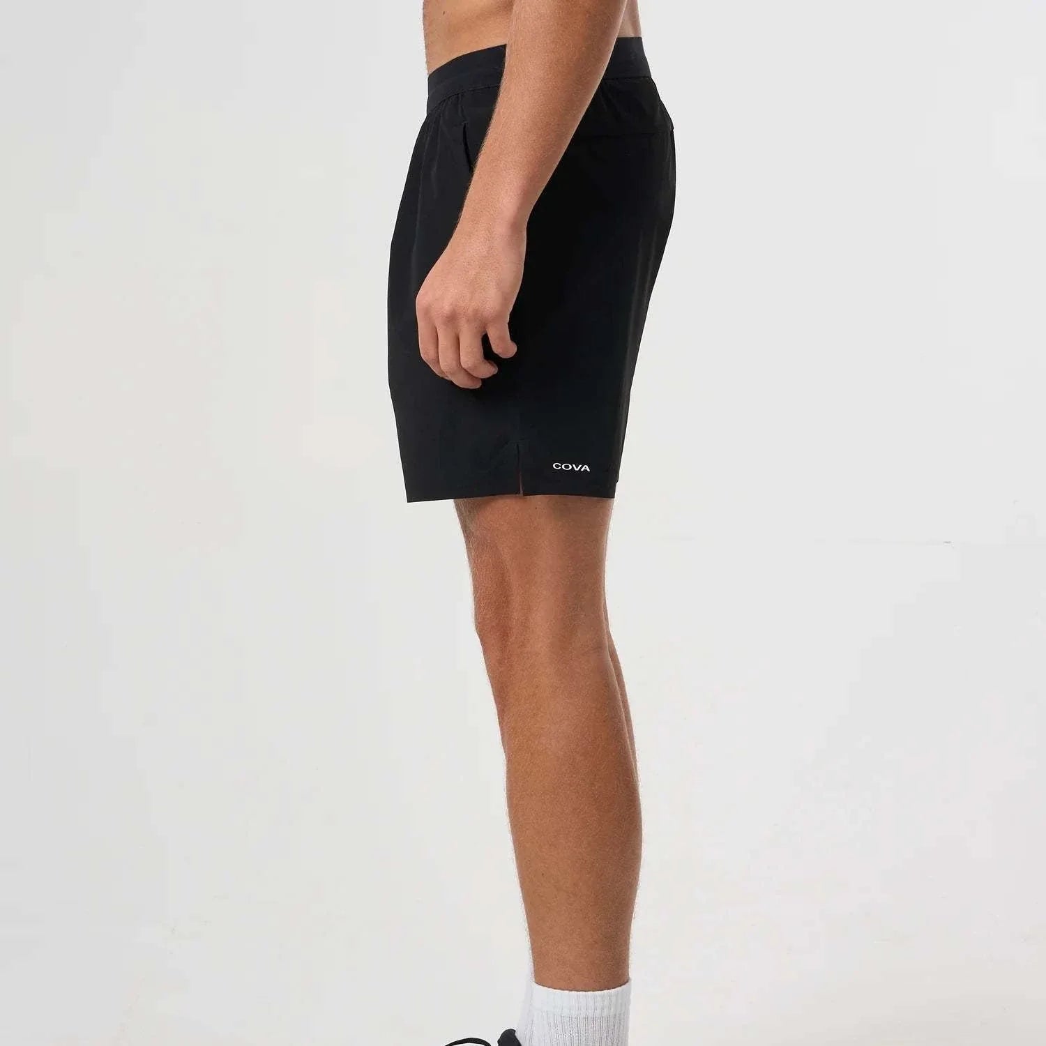 Black Cova Daily Shorts worn by male model side view