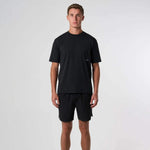 Cova Daily T-Shirt black casual fit worn by male model standing against white background