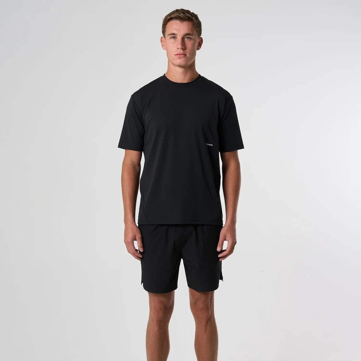 Cova Daily T-Shirt black casual fit worn by male model standing against white background