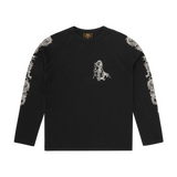 Black Corteiz Dragon Ragan long sleeve shirt with dragon graphics on chest and sleeves
