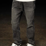 Siarr Flared Jeans washed black denim with open hem and branded rivet buttons