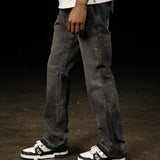 Black Siarr Flared Jeans with open hem and branded rivet buttons in 100% denim, 32" leg length