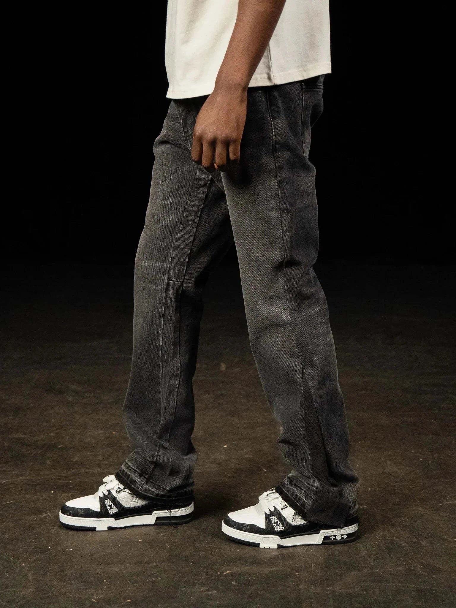 Black Siarr Flared Jeans with open hem and branded rivet buttons in 100% denim, 32" leg length