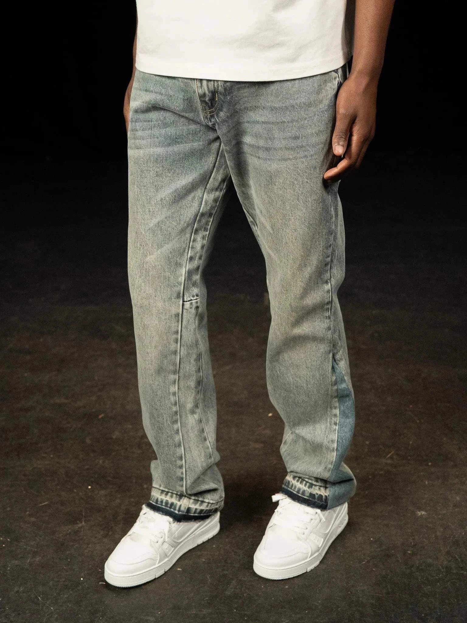 Siarr Flared Jeans Dusty Blue with branded rivet buttons and open hem in 100% denim