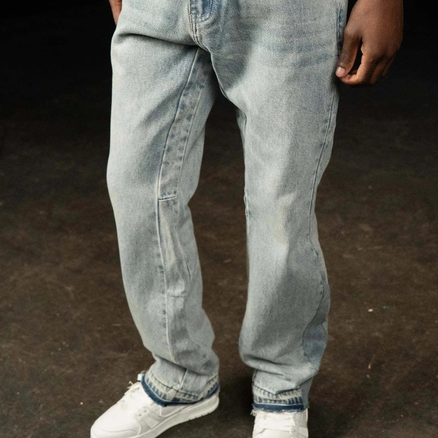 Siarr Flared Jeans in triple blue denim with flared fit and open hem worn by model