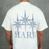White Siarr Stardust Tee with large back graphic, relaxed fit, ribbed crew neck, and 100% cotton fabric.