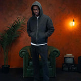 Man wearing Siarr Washed Piping Joggers in washed black with elasticated waistband and slit pockets