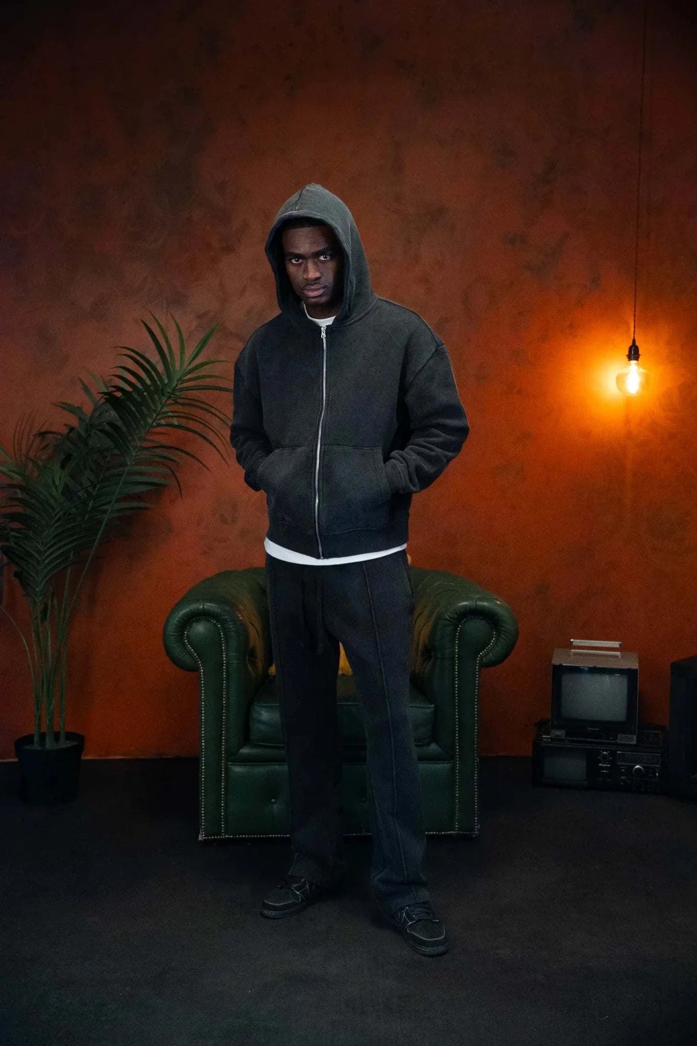 Man wearing Siarr Washed Piping Joggers in washed black with elasticated waistband and slit pockets