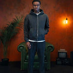 Siarr Washed Zip Through Hoodie in washed black with full zip and kangaroo pockets on male model