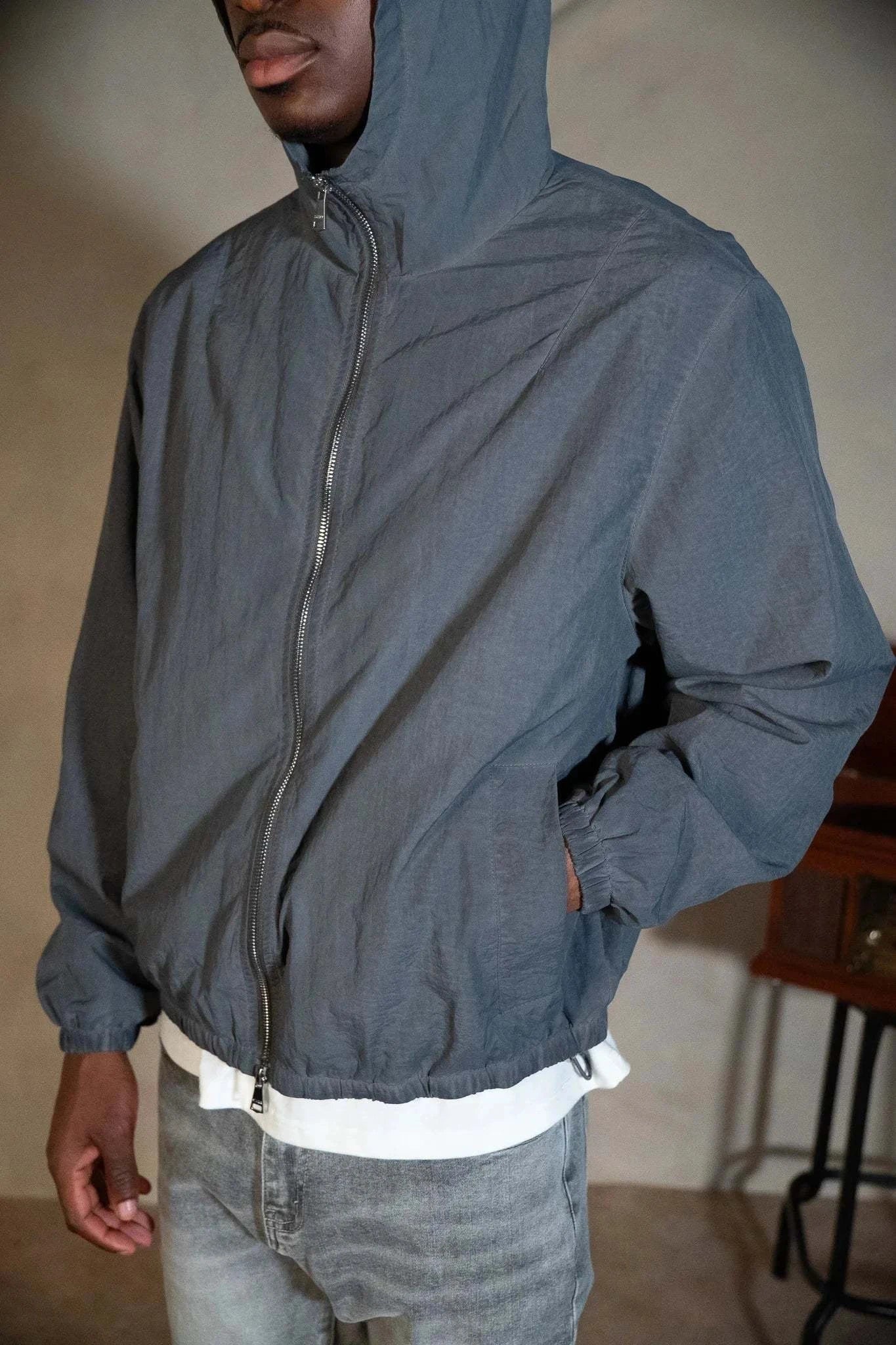 Siarr Cold Wash Windbreaker blue and grey nylon jacket with 2-way zip and side slit pockets