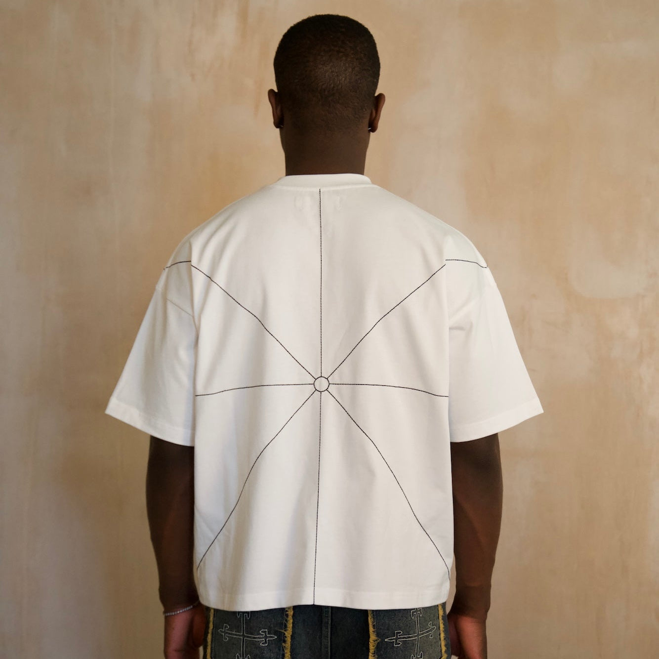 White Saint Mind Pathway T-shirt with embroidered stitching and oversized boxy fit