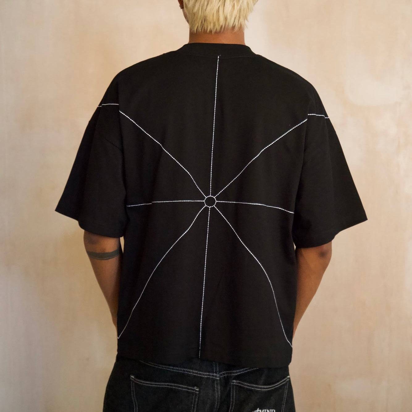 Black Saint Mind Pathway T-shirt with embroidery, oversized boxy fit, 100% cotton, worn by model 5ft10" in medium size