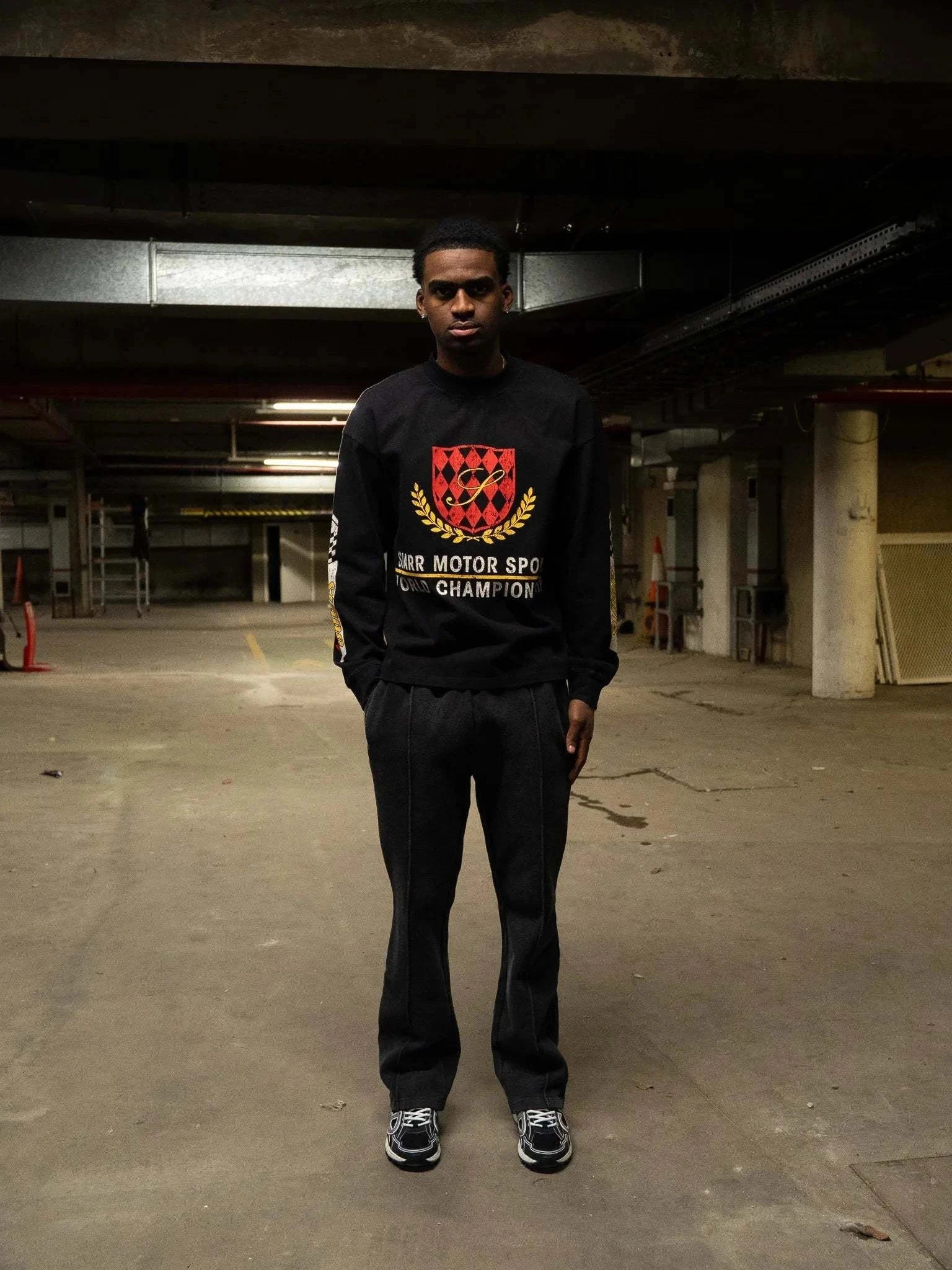 Siarr Motor Sport oversized washed black long sleeve tee with ribbed neck and screen print in heavyweight cotton fabric