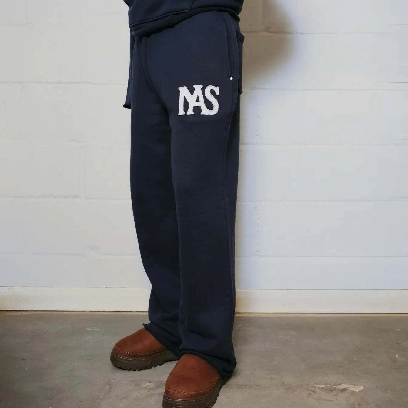 Natural Art Studio navy applique sweatpants with elastic waistband and relaxed oversized fit