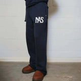 Natural Art Studio navy applique sweatpants with elastic waistband and relaxed oversized fit