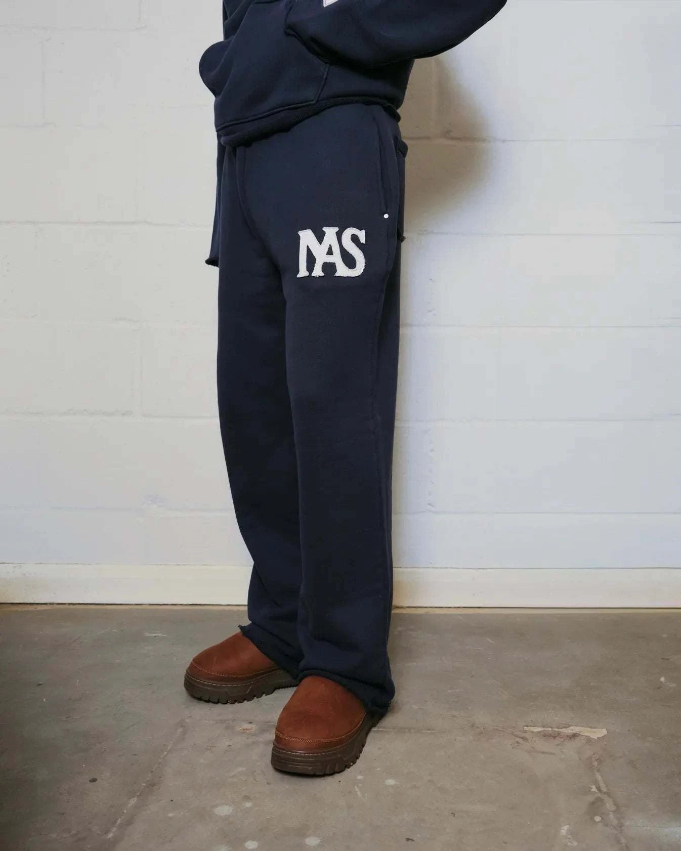 Natural Art Studio navy applique sweatpants with elastic waistband and relaxed oversized fit
