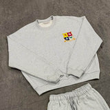 Light grey Five Questions Rugby sweatshirt with embroidered crest on chest