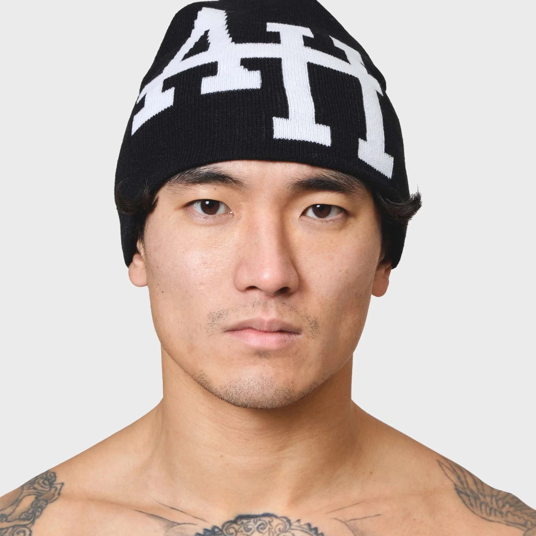Black ANNIE HOOD AH BEANIE made of lightweight poly/cotton mix