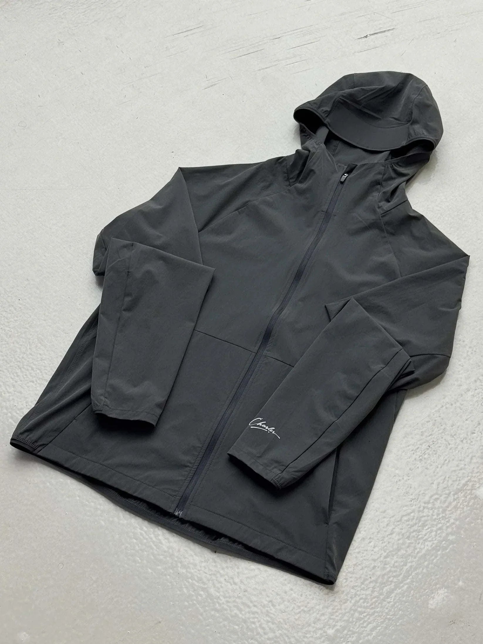 Studio By Charles Grey black track jacket with hood and zipper, lightweight and casual design