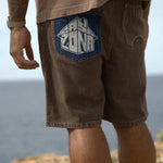 Last Lesson Badged Casazøna shorts with denim patch pocket detail