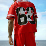 Man wearing red Last Lesson Eagle Jersey with number 63 on back by the ocean