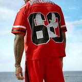 Man wearing red Last Lesson Eagle Jersey with number 63 on back by the ocean