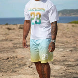 Man wearing Last Lesson Gradient Jersey t-shirt and shorts with gradient colors on beach background