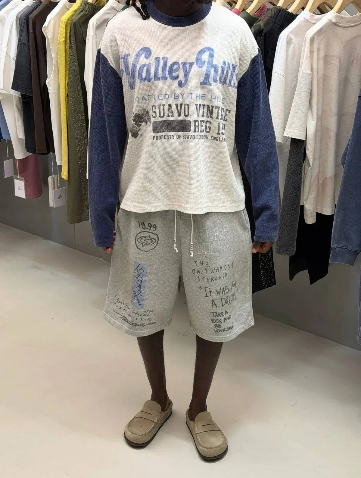 Washed grey Valley Hills shorts with punk-inspired graphics and vintage faded texture from Suavo London collection