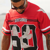 Man wearing red Last Lesson Eagle Jersey with eagle graphics and number 90 design