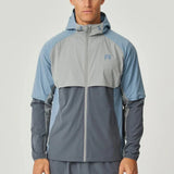 Reprimo Vortex Windbreaker in dusky blue with ergonomic design and reflective details, lightweight and wind-resistant jacket for active wear