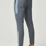 Reprimo Vortex Pants in dusky blue with ergonomic paneling and adjustable waistband for flexible activewear.
