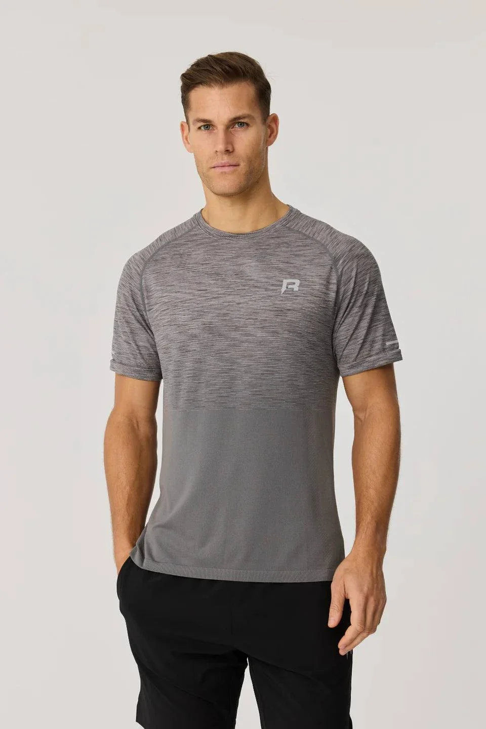 Reprimo Axis T-Shirt titanium seamless athletic fit with reflective detailing worn by male model