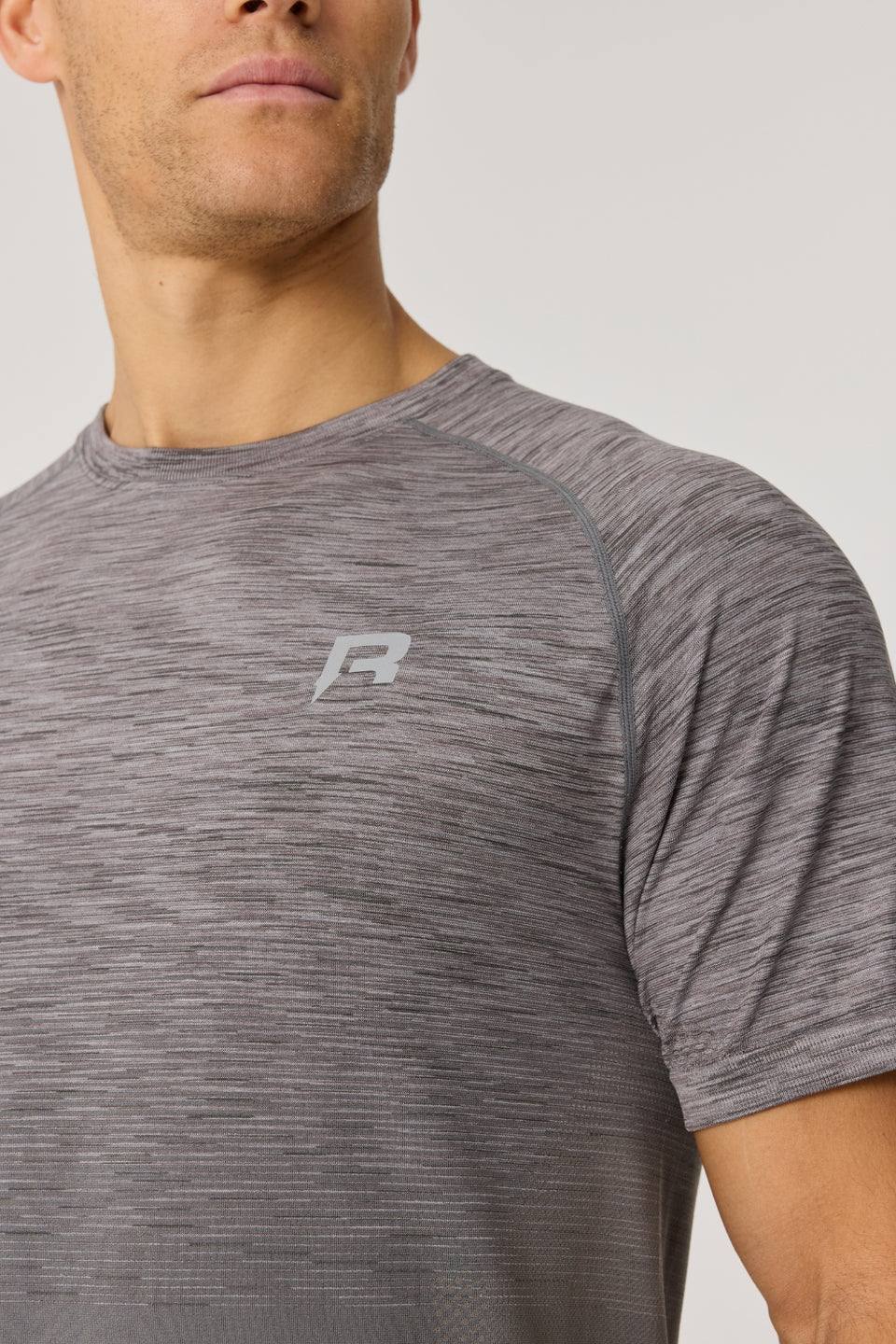 Reprimo Axis T-Shirt in titanium color with seamless, body-sculpting design and reflective details for athletic fit and performance.