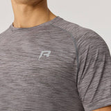 Reprimo Axis T-Shirt in titanium color with seamless, body-sculpting design and reflective details for athletic fit and performance.