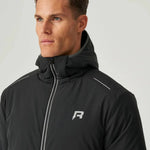 Man wearing black Reprimo Clima Jacket with hood and zippered front