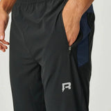 Reprimo Nova Pants in black and navy with lightweight dual-fabric design and ergonomic fit for active performance