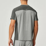 Back view of man wearing Reprimo Nova T-Shirt in slate and marble with duo-tone design and reflective detailing