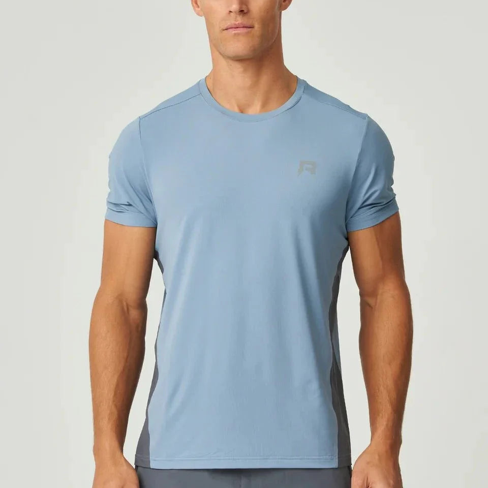 Reprimo Vortex T-Shirt in dusky blue with ergonomic panels and lightweight fabric for athletic performance